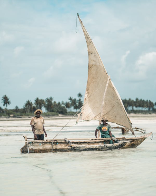 Men riding a boat